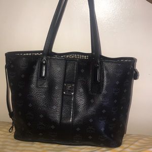 Black mcm bag with mini pouch